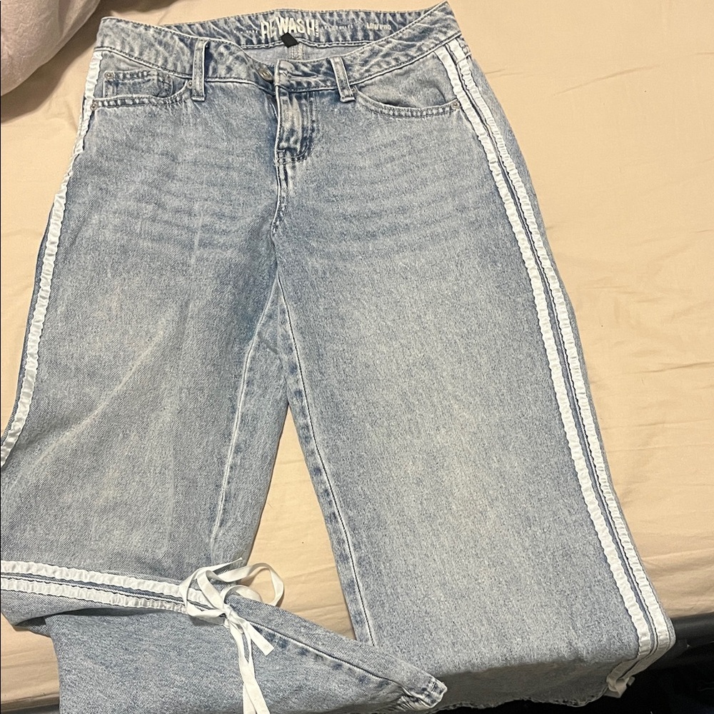 Stylish Light Blue Jeans with White Accents